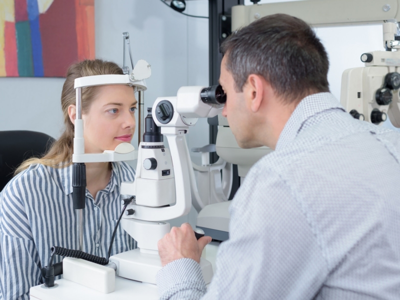 doctor-examing-adult-male-patient-PK84T3G-min